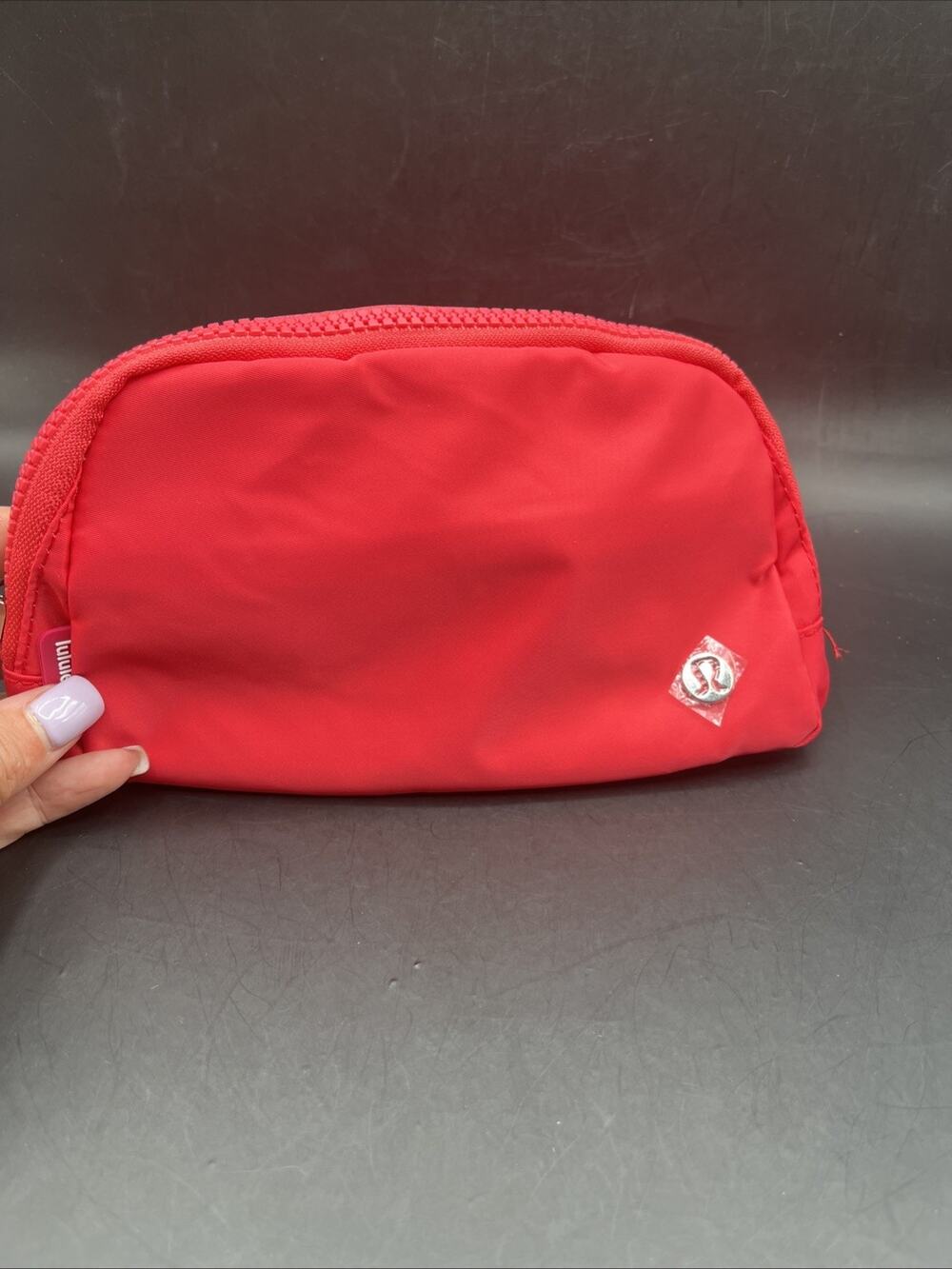 hot pink lululemon belt bag